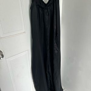 Athleta”Calm Cool” romper in black.